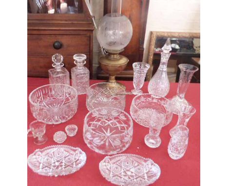 Brass oil lamp with etched glass globe, four cut glass fruit bowls and three decanters, also other glass ware. Condition repo