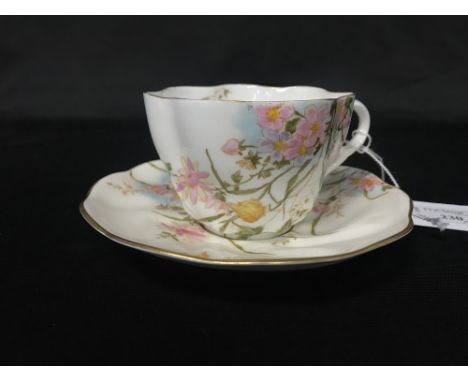 FLORAL AND GILT PART TEA SERVICE along with four stoneware serving dishes
