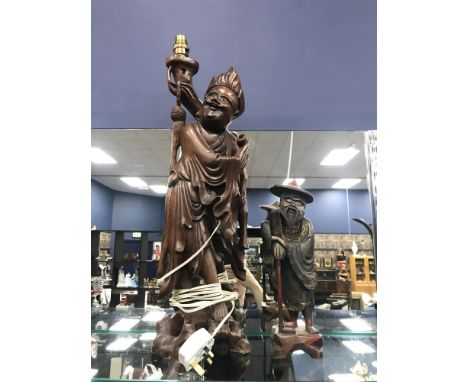 CARVED WOOD FIGURAL LAMP along with a wooden figure (2)