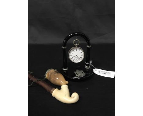 SILVER POCKET WATCH on a later stand; along with a silver medal and pipe (3)