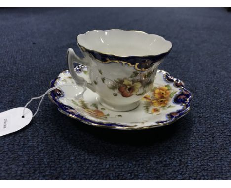 EARLY 20TH CENTURY WELLINGTON CHINA TEA SERVICE decorated with flowers in yellow and red with gilt details