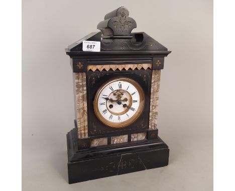 A late 19th Century black marble mantel clock, exhibition escapement dial