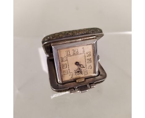 A c1930's silver and shagreen cased travel clock