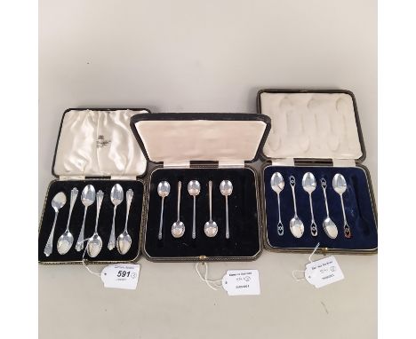 A cased set of six silver teaspoons, hallmarked Sheffield 1923, by Joseph Rodgers, together with two part sets of silver spoo