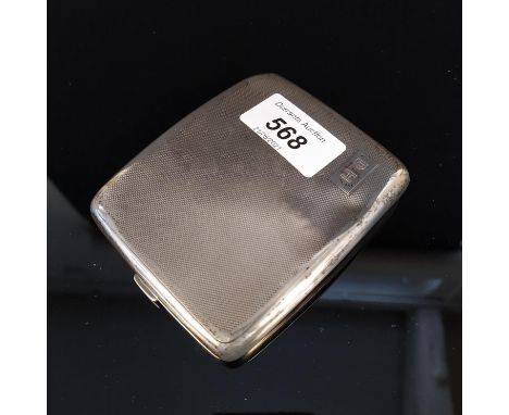 A silver cigarette case with engine turned decoration (heavily dented) weight approx 130g