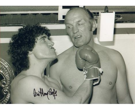 Sir Henry Cooper signed 16 x 12 black and white boxing photo, amusing image with Kevin Keegan. English heavyweight boxer know