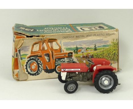 A Britains Massey Ferguson Tractor 135, 9529, boxed. 
