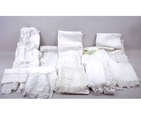 A quantity of linen including a christening dress with lace and pin tucking, another infant's dress, a child's smock with Bro