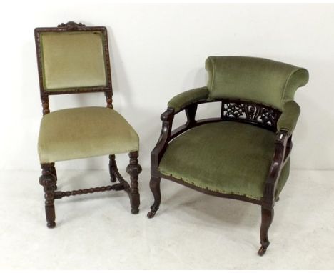 A French carved oak dining chair with light green upholstered seat and back, 91cm high, together with a Victorian tub chair, 