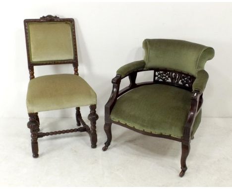 A French carved oak dining chair with light green upholstered seat and back, 91cm high, together with a Victorian tub chair, 