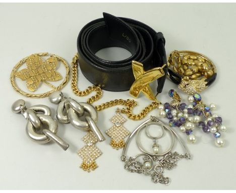 A quantity of costume and designer jewellery including a Nina Ricci necklace, Monet bangle, an Elsma maple leaf brooch, and a