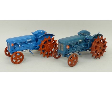 A Britains Fordson Major tractor with stud wheels, and a later similar tractor.