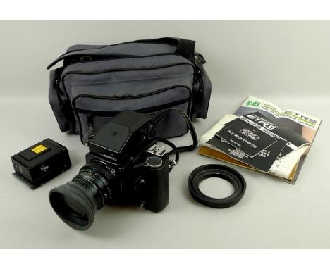 A Zenca Bronica ETR Si camera with canvas case and instruction manual.