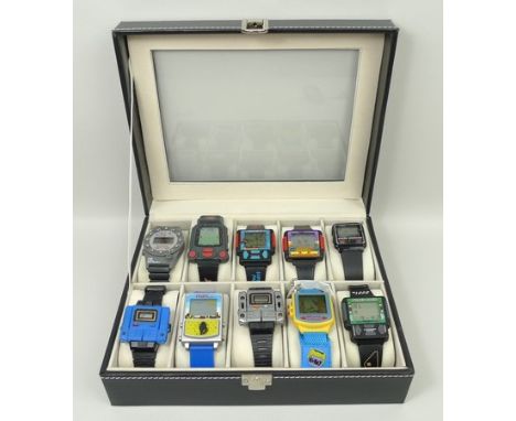 A quantity of LCD comic and novelty watches, some with games, comprising; Nelsonic Black Jack, Winnie the Pooh, Tiger Dick Tr