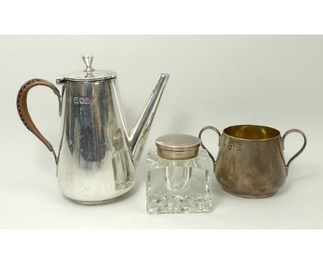 A Victorian coffee pot for one of outswept form, the handle with cane strap handle, a twin handle sugar bowl, Hukin & Heath, 