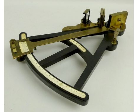 A Negretti and Zambra ebony octant, mid 19th century, with an ivory scale, the brass index arm with vernier, 24.5 by 31 by 8c