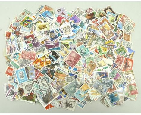 A collection of loose stamps including GB, Commonwealth, and first day covers. 