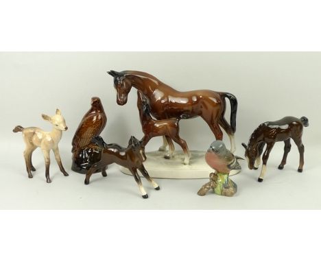 A group of Beswick figures, comprising; Bambi, yearling, foal, chaffinch no 991, and a Beneagles Scotch whisky decanter model