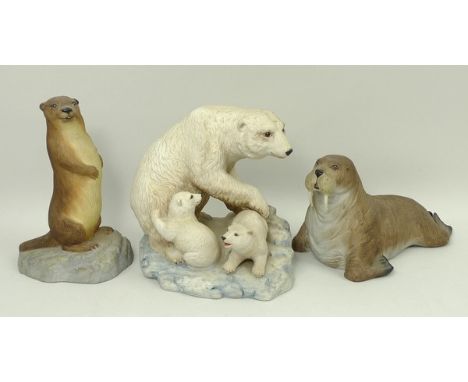 A group of Aynsley bisque porcelain figures, comprising; a Walrus, Otter and a Polar Bear with cubs, printed marks. (3)