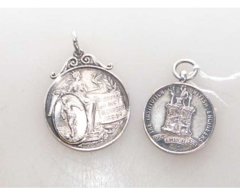 Two medallions (one hallmarked silver)