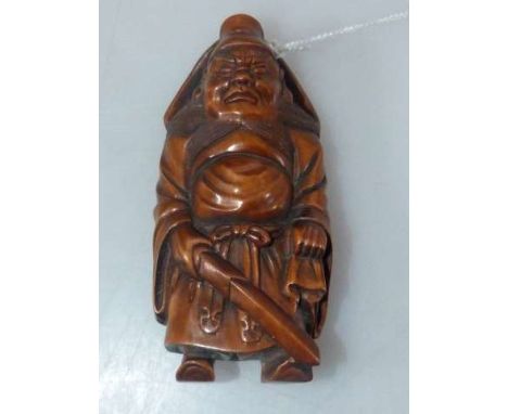 Japanese fruitwood netsuke, carved as a samurai, signed