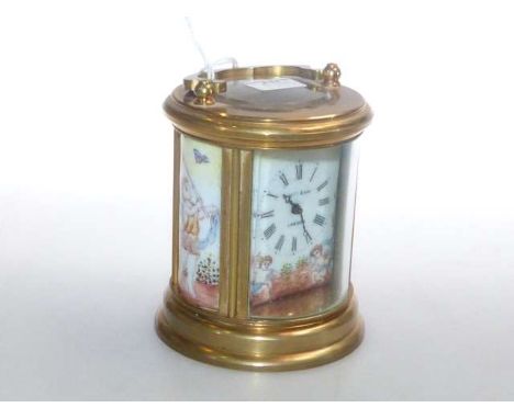 Brass-cased carriage clock of oval-section, signed Elliott & Son, London