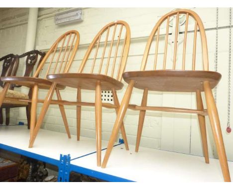 Three Ercol light oak rail back dining chairs
