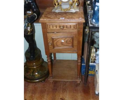 Continental walnut pot cupboard with inset marble top above frieze drawer and cupboard raised on turned legs with under shelf