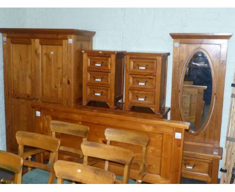 Six piece pine bedroom suite comprising double wardrobe, chest of drawers, pair of pedestal chests, cheval mirror and kingsiz