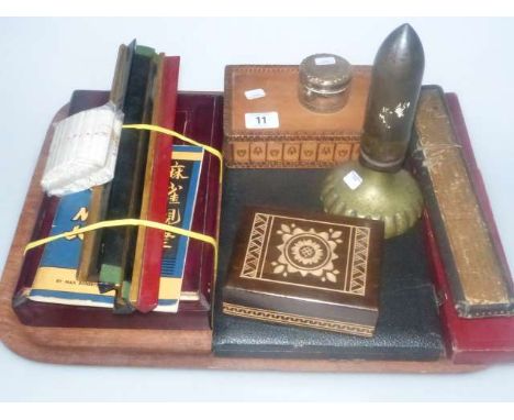 Mah-Jong set, drawing instruments and rules, playing cards, silver topped jar and war relic