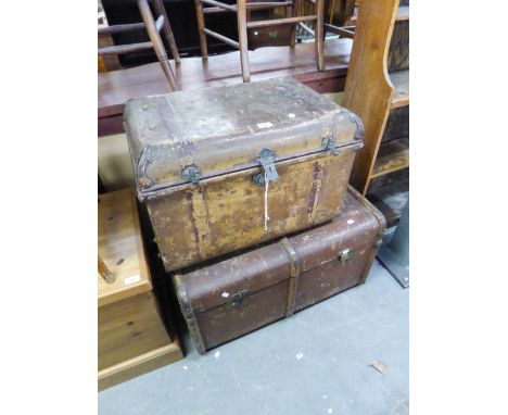 A LARGE FIBRE CABIN TRUNK AND A SMALLER METAL TRUNK (2) 