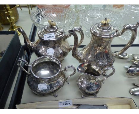 VICTORIAN ELECTROPLATE TEA AND COFFEE SERVICE OF FOUR PIECES, PEAR SHAPED REPOUSSE WITH FLOWERS, RAISED ON TAB FEET (4)