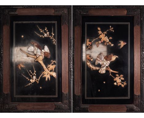 PAIR OF ORIENTAL MOTHER OF PEARL AND BONE MOUNTED BLACK LACQUERED WALL PANELS, each of oblong form, decorated with perched bi