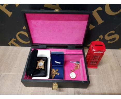 A MUSICAL JEWELLERY BOX CONTAINING CRUCIFIX POCKET WATCH MINIATURE CLOCK AND A MONEY BOX IN THE FORM OF A TELEPHONE BOX