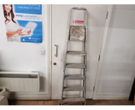 A PAIR OF FOLDING METAL STEP LADDERS