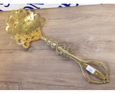 VINTAGE BRASS SKIMMER FLEUR DE LIS PERFORATIONS AND CADUCEUS TO THE HANDLE