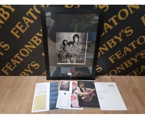 MICHAEL JACKSON HOLDING BUBBLES THE CHIMP INSCRIBED AND SIGNED PHOTO WITH COA GIVEN TO AN ASSISTANT KENT TWITCHELL WHO WAS PR