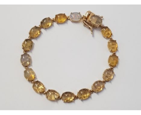 GOLD 9CT OPAL AND YELLOW STONE BRACELET, 13G