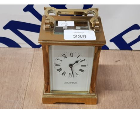 REID AND SONS NEWCASTLE UPON TYNE VINTAGE BRASS CARRIAGE CLOCK WITH WHITE ENAMEL DIAL