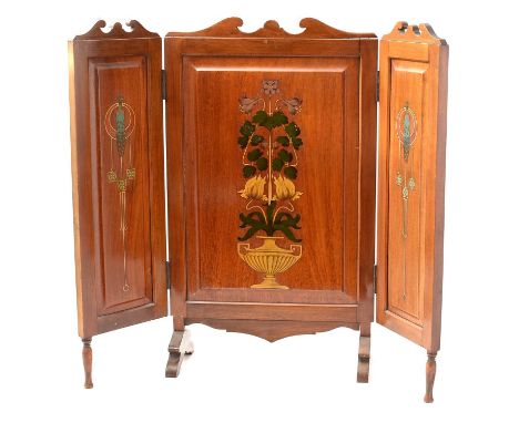 An early 20th Century Arts &amp; Crafts inlaid triptych fire screen, with central panel decorated with a vase issuing flowers