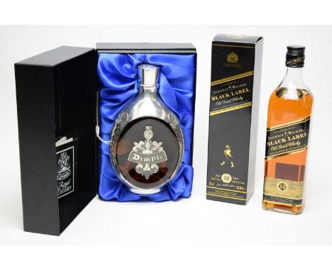 A Dimple Royal decanter de-luxe scotch whisky, one bottle, 75cl., 43% vol, in presentation case, with booklet numbered 4009; 