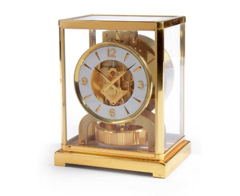 A 20th Century Jaeger Le Coultre Atmos clock, the white enamelled chapter ring with Arabic and dagger markers, having an expo