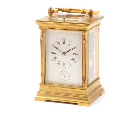 A late 19th Century Grand Sonnerie carriage clock, the white enamel roman dial above subsidiary alarm aperture, fitted a repe