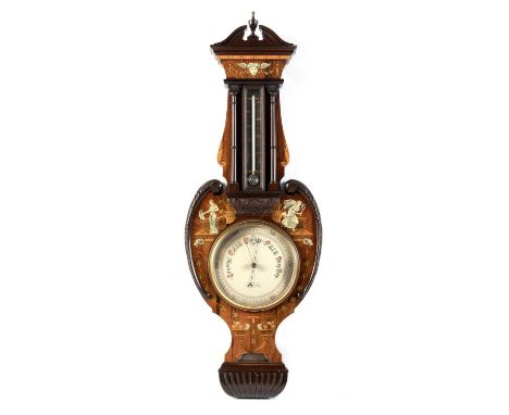 An early 20th Century inlaid rosewood barometer, by T.B. Winter, Newcastle upon Tyne, the silvered barometer dial under therm