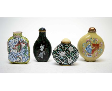 A Chinese enamel snuff bottle decorated with dragons and clouds, yellow ground, 6.5cms; another with fish and snail decoratio