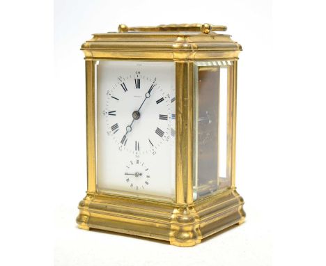 Breguet: a late 19th Century French gilt brass carriage alarm clock, in gorge case, with enamelled roman dial, outer arabic d