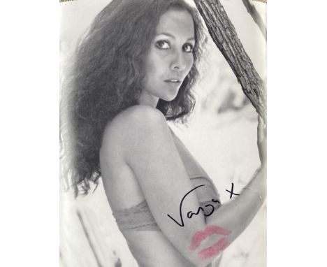 007 Bond actress Page 3 topless model Vanya signed and kissed 10 x 8 b/w photo. Has lipstick kiss to lower RH side. Good Cond