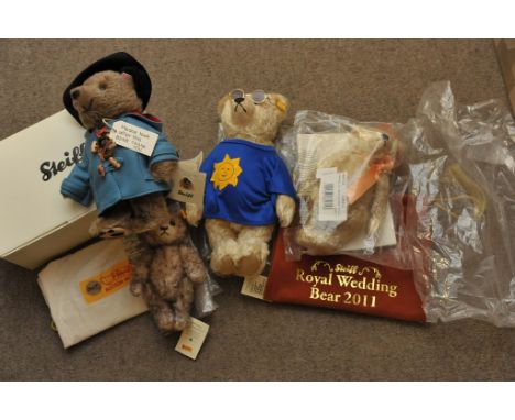 A Steiff boxed Paddington Bear Anniversary bear, A Summer bear wearing blue top with sun emblem, A 2011 Royal Wedding William