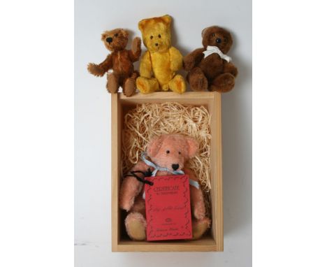 Three miniature jointed bears possibly by Steiff and a limited edition German Johanna Haida collector's bear, boxed