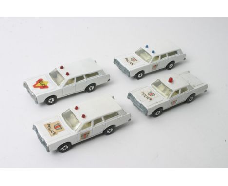 Four Matchbox Superfast No. 55 Mercury Police Cars, one having double blue lights on roof, two with double red lights both ve